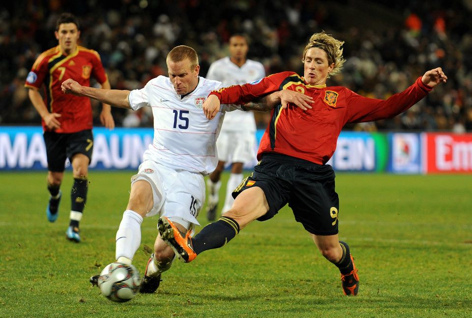 Jay swiping the ball away from Fernando Torres